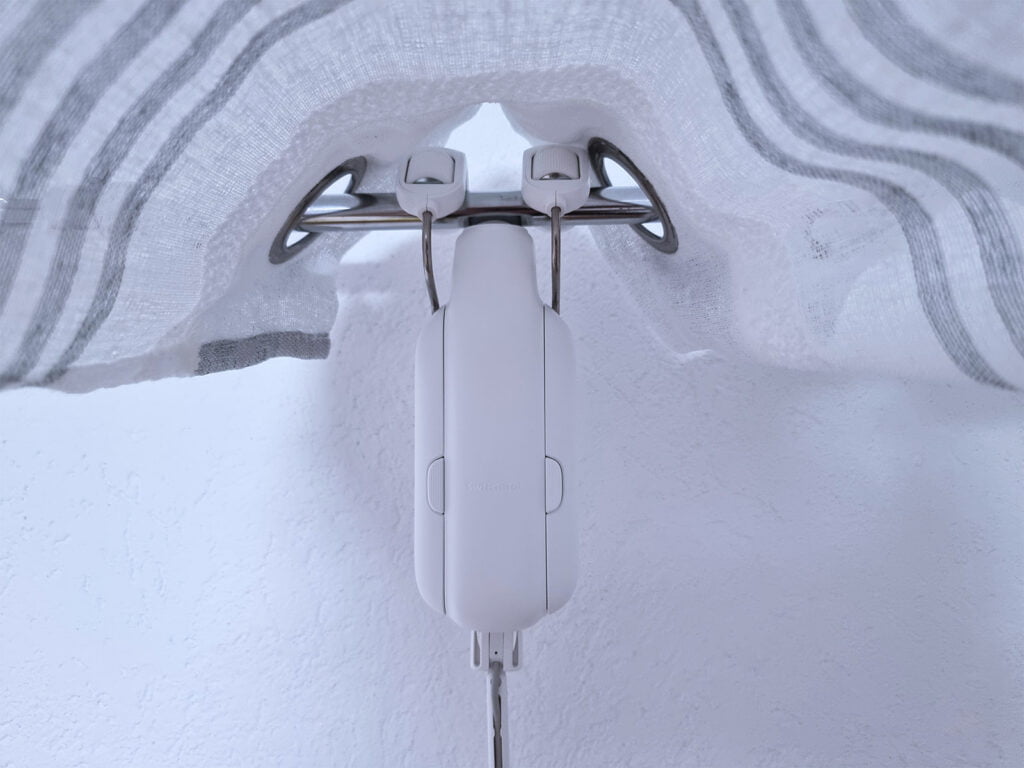 SwitchBot Curtain 3 mounted on existing rod