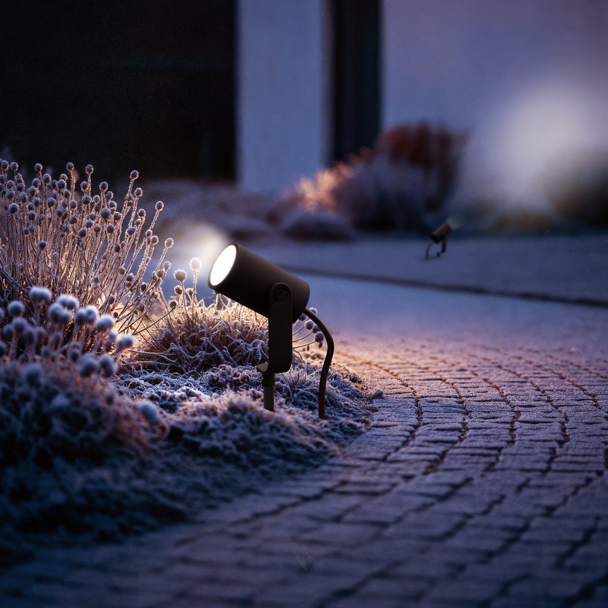 innr outdoor spots in landscape bed